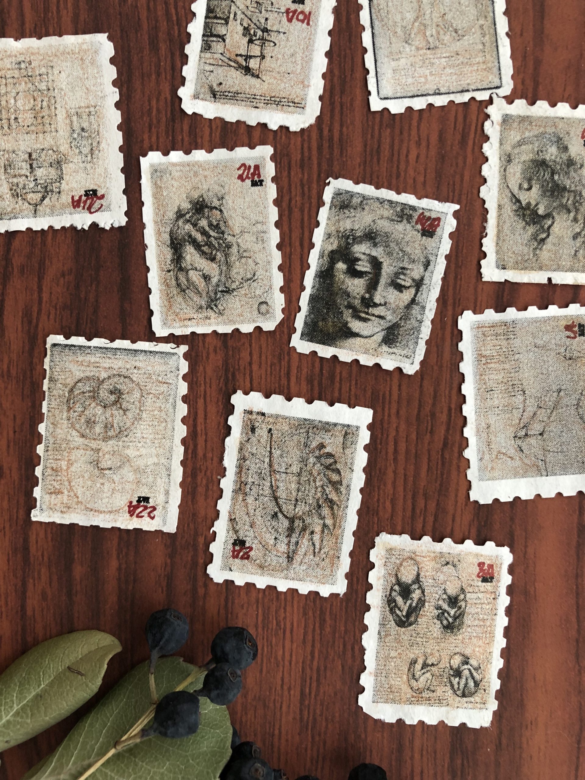 Some of Betty's handmade, hand-cut faux postage stamps