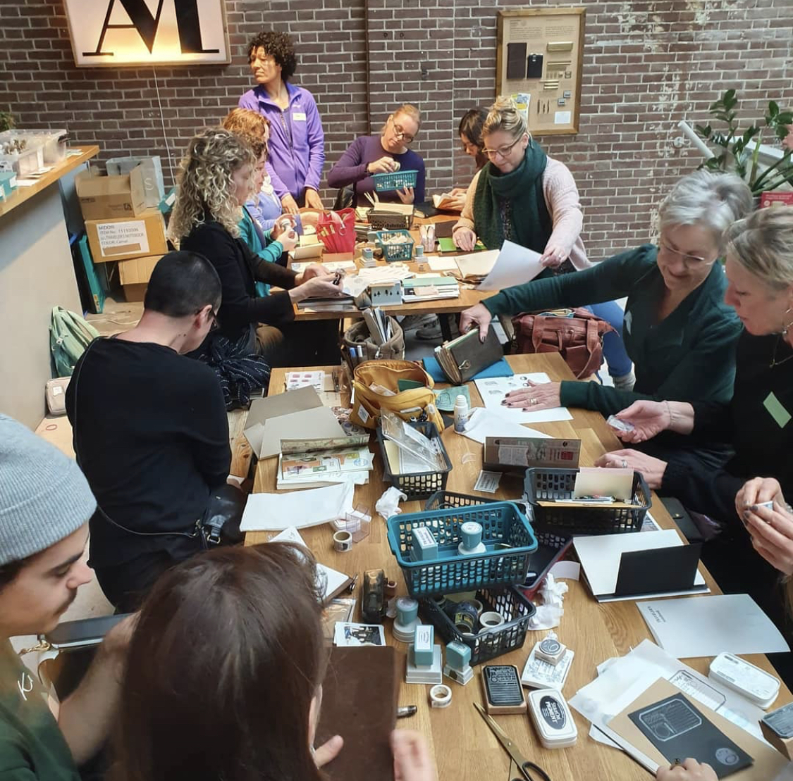 Journaling enthusiasts at Cafe Analog's Stationery Cafe