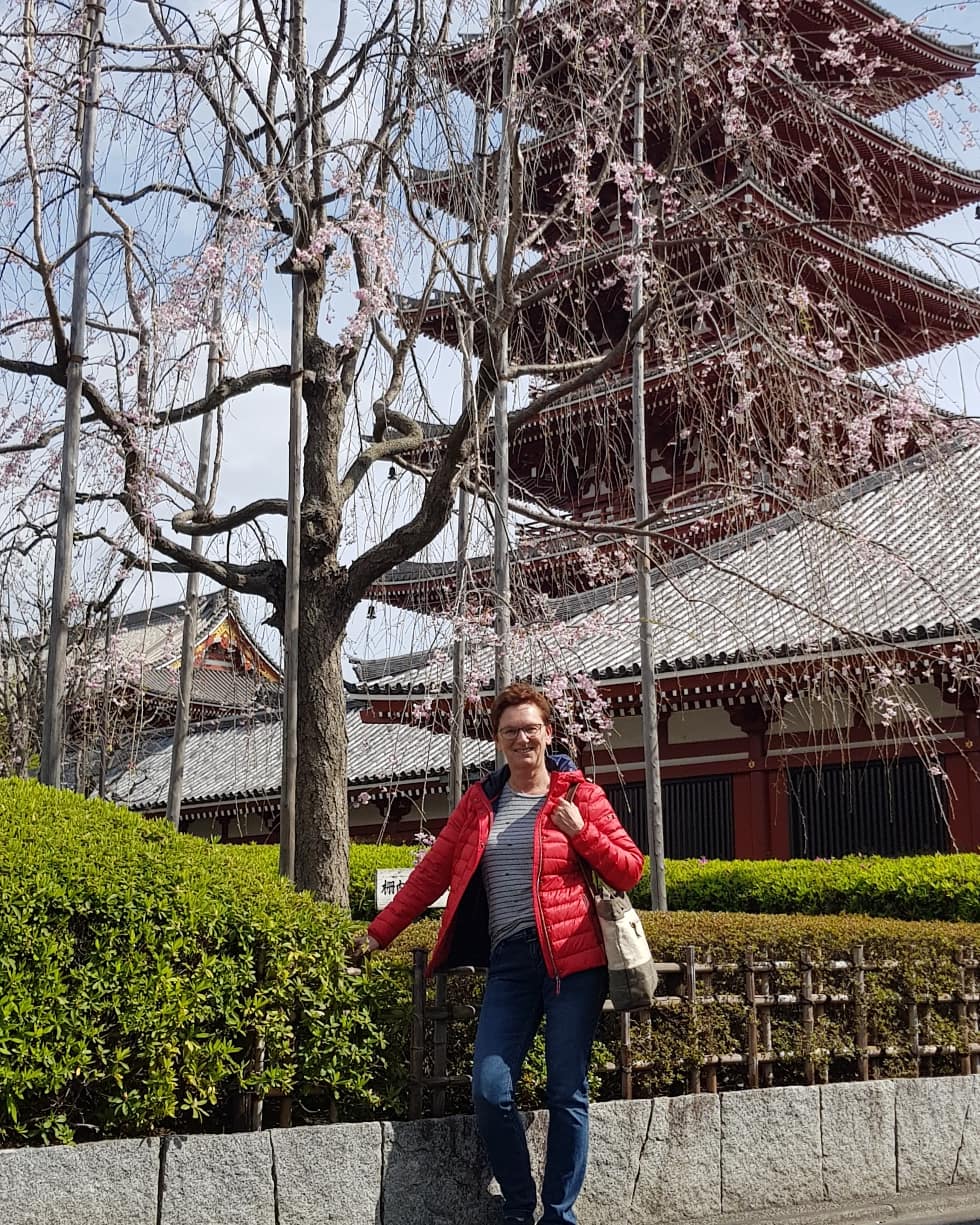 Desiree in front of a pagoda during her 2019 Japan tour